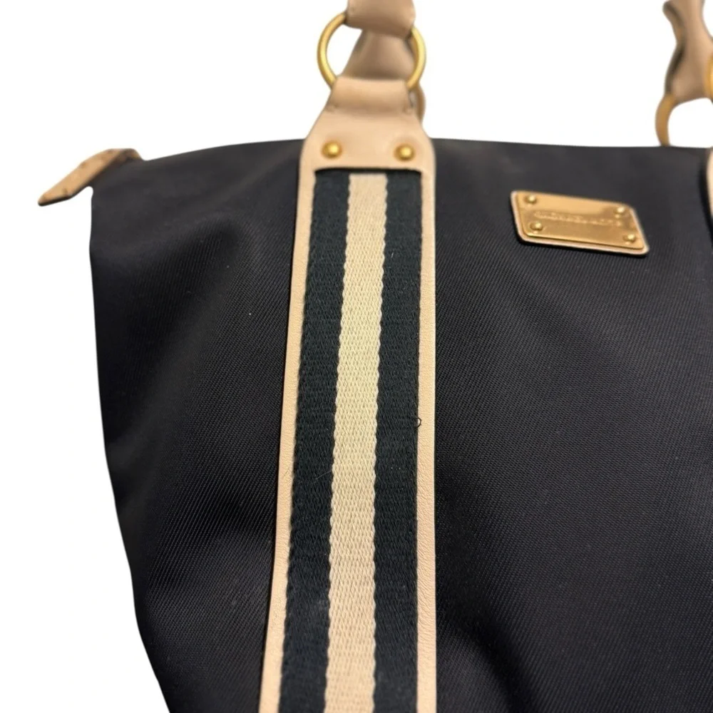 Michael Kors Black and Tan Tote with Structured Design